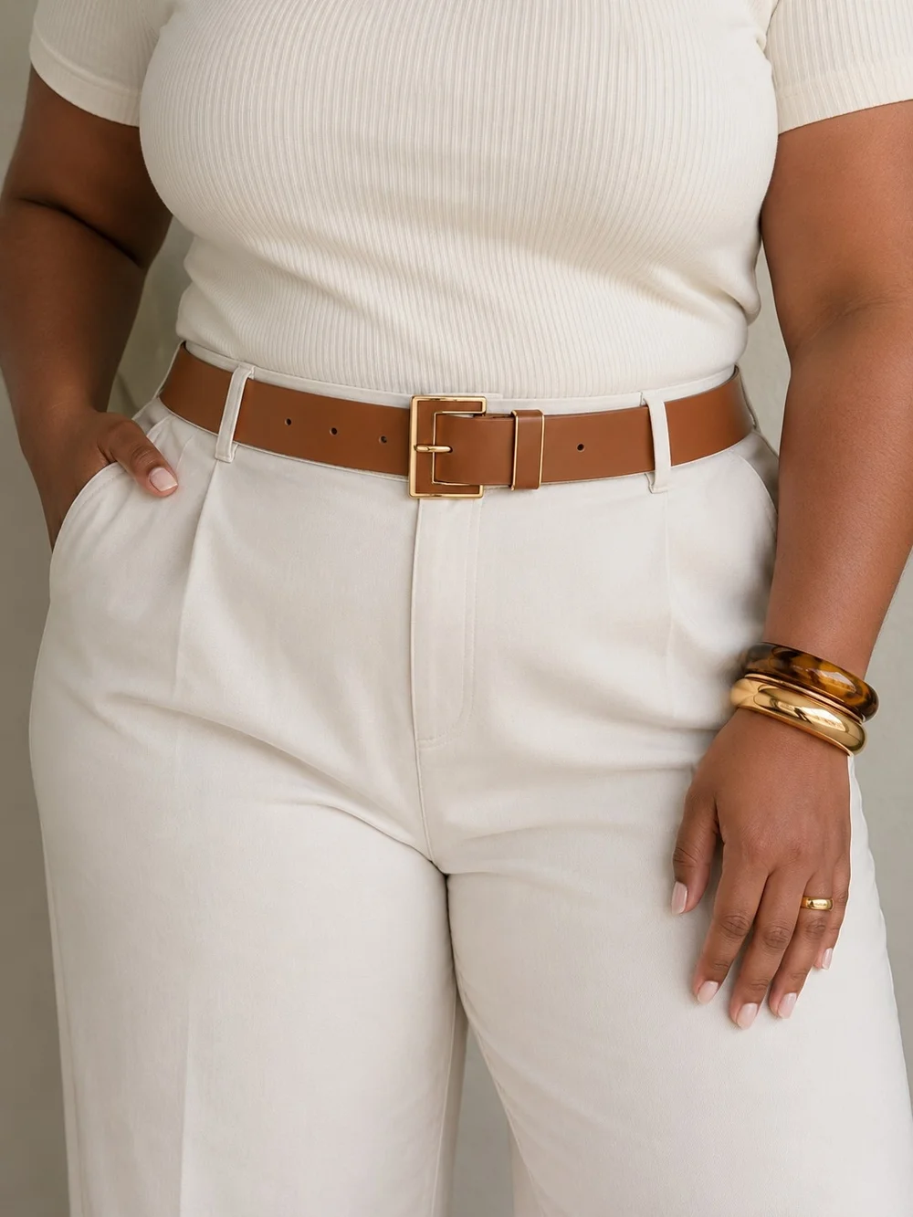 Stylish Tan Leather Belt with Gold 'E' Buckle